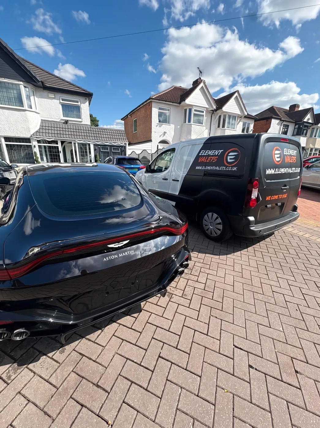 Aston Martin with the Element Valets van